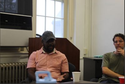 Close up of two grad students in discussion 