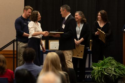 Noga Shemer receiving award